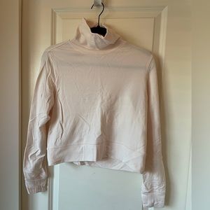 Athleta cream turtleneck, size small.